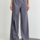 Брюки з запахом сірі