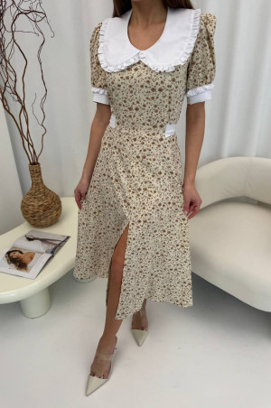 Легка молочна сукня в квітковий принт 