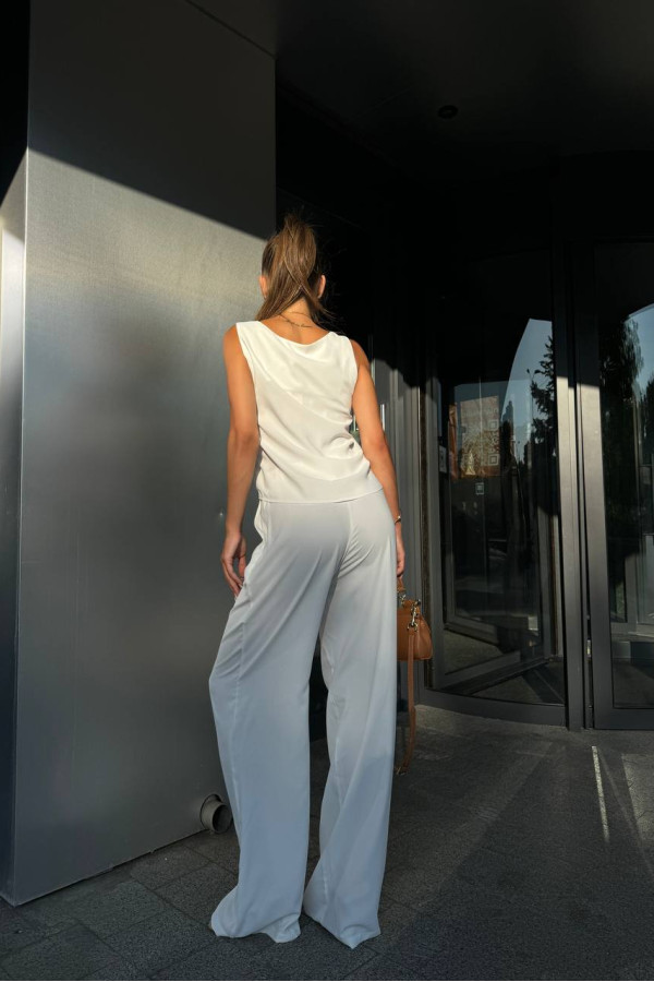 Легкі штани вільного крою молочні