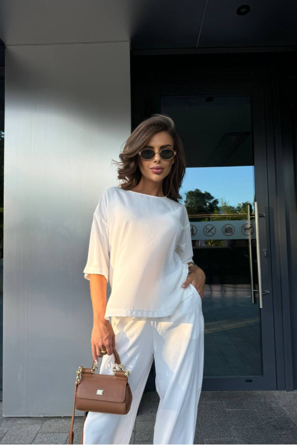 Легкі штани вільного крою молочні